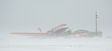 The German research aircraft Polar 5 at the Eureka Weather Station in driving snow. (Photo: Stefan Hendricks, AWI)